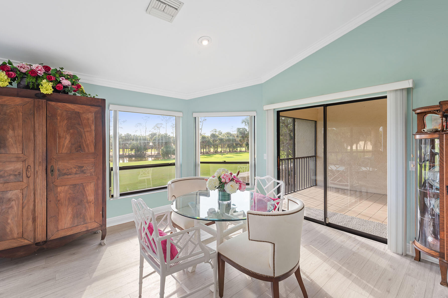 792 Eagle Creek Drive, Unit 204 Naples, FL 34113 - Photo 8 of 49 a dining room with furniture window and outside view