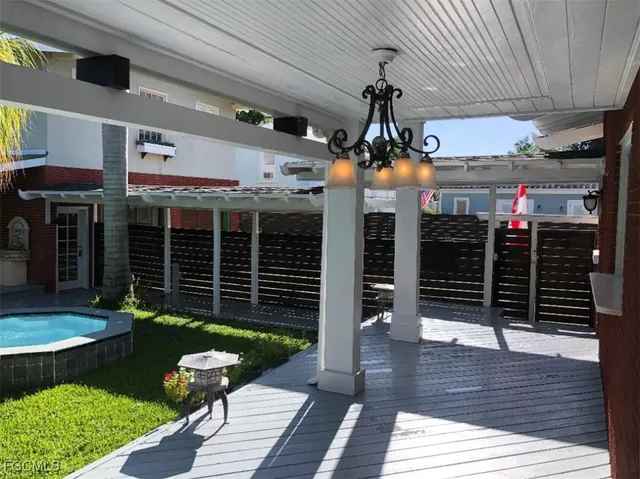 a backyard of a house with seating space