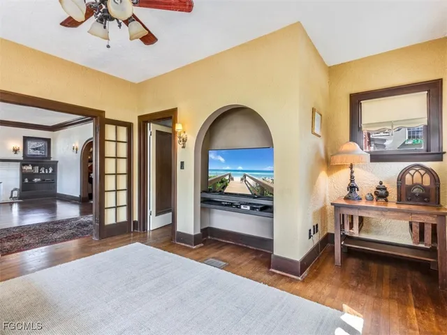 a view of living room with furniture and flat screen tv