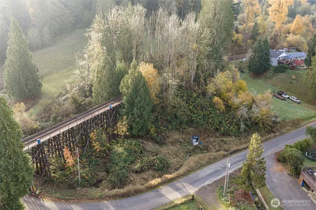 a view of a balcony with wooden fence