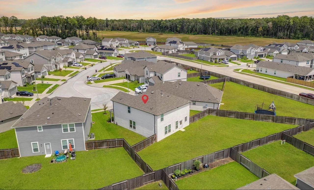 23543 Powmill Street Spring, TX 77373 - Photo 11 of 11 a view of a city with lawn chairs