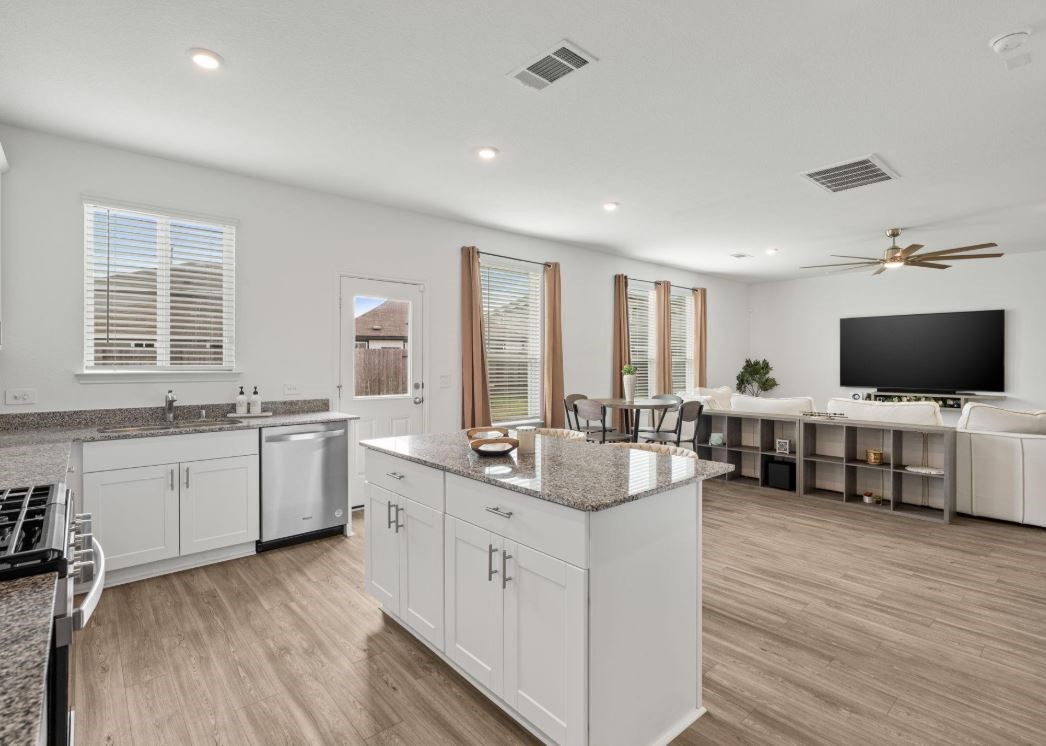 23543 Powmill Street Spring, TX 77373 - Photo 4 of 11 a open kitchen with sink cabinets and window