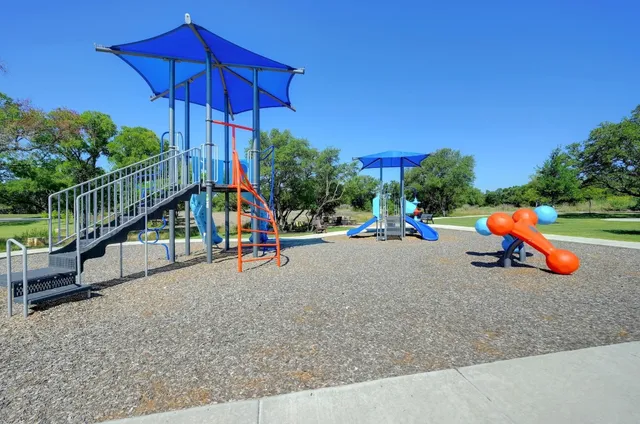 a view of a park with slide