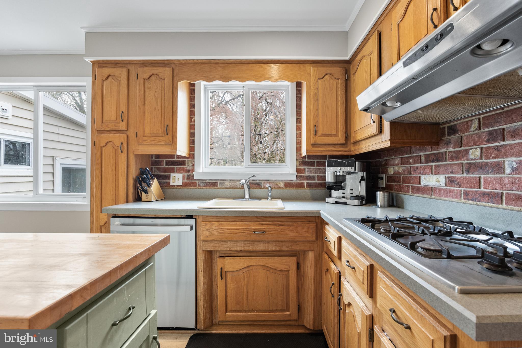201 Hamilton Road Marlton, NJ 08053 - Photo 12 of 50 a kitchen with a stove a sink and a cabinets