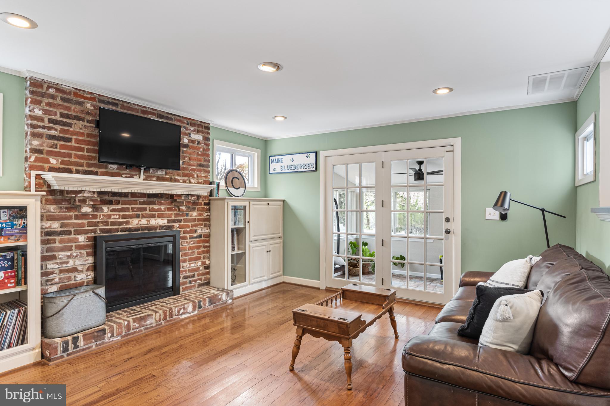 201 Hamilton Road Marlton, NJ 08053 - Photo 19 of 50 a living room with furniture a flat screen tv and a fireplace