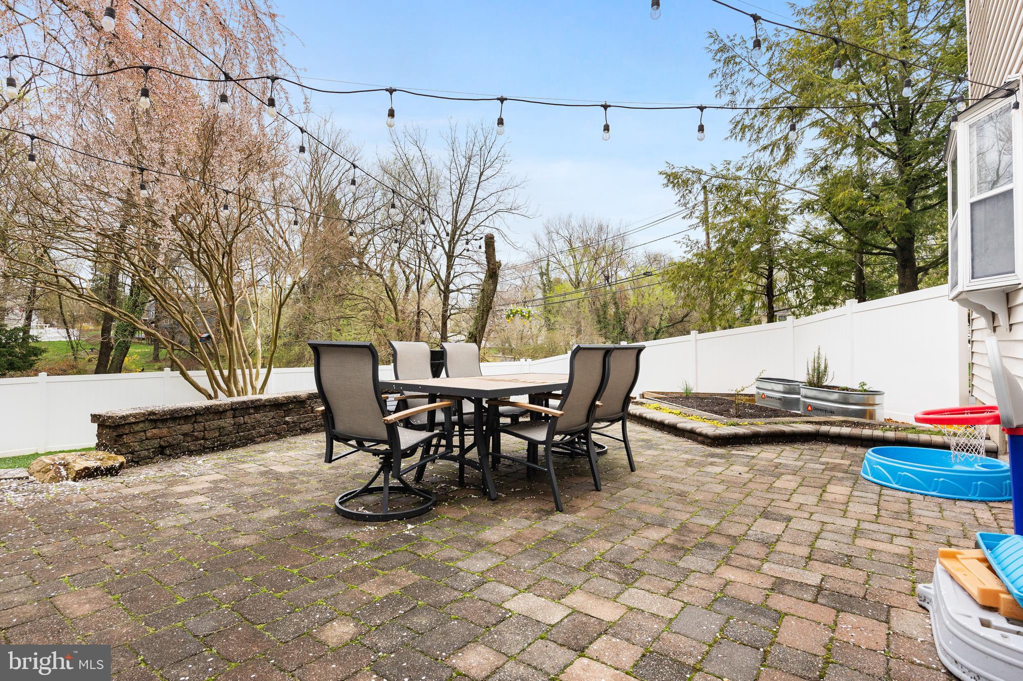 201 Hamilton Road Marlton, NJ 08053 - Photo 44 of 50 a view of a patio with table and chairs and potted plants