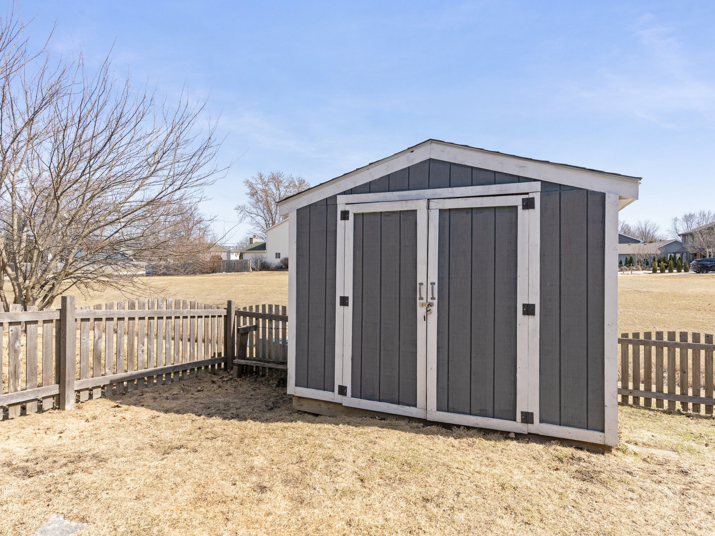 1400 Bar Harbour Road Aurora, IL 60504 - Photo 16 of 25 a view of a house with wooden fence and floor