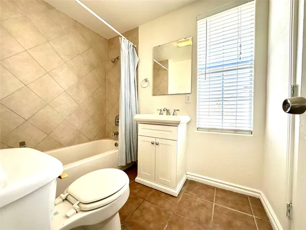 a view of a backyard of the house