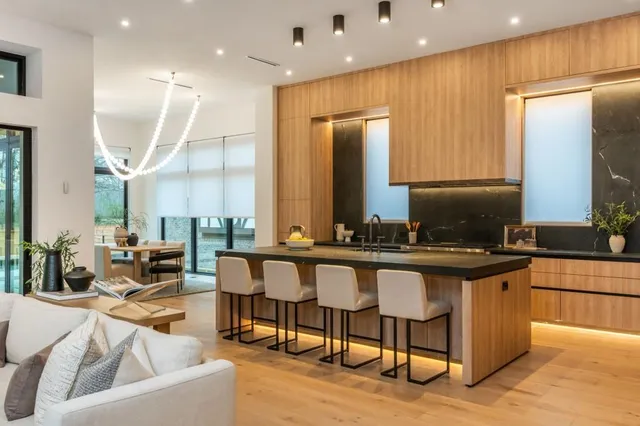 a very nice looking kitchen with a large window