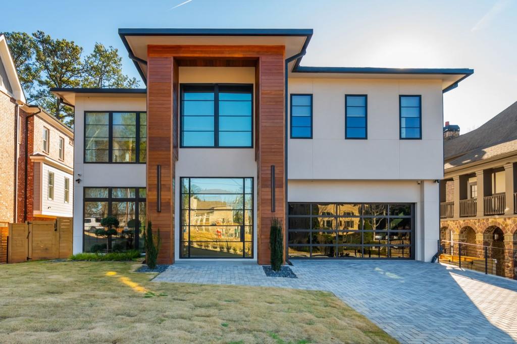 1127 Wimberly Road Northeast Atlanta, GA 30319 - Photo 2 of 37 a view of an house with backyard and a fireplace