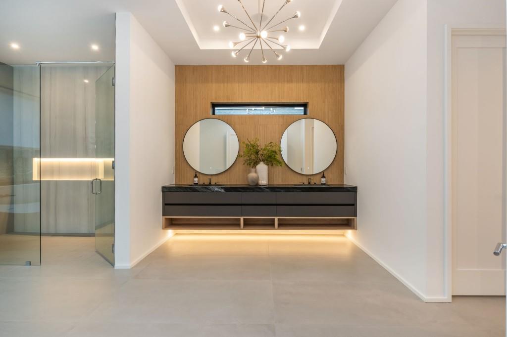 1127 Wimberly Road Northeast Atlanta, GA 30319 - Photo 28 of 37 a living room with a couch and a mirror