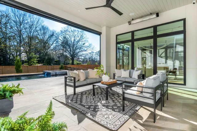 a outdoor living space with patio furniture and a potted plant