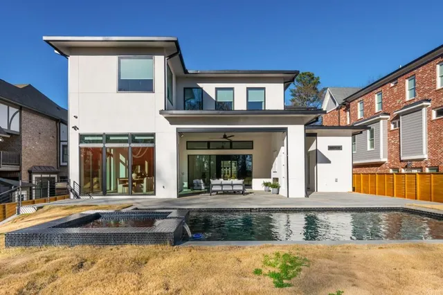 a view of a house with a swimming pool