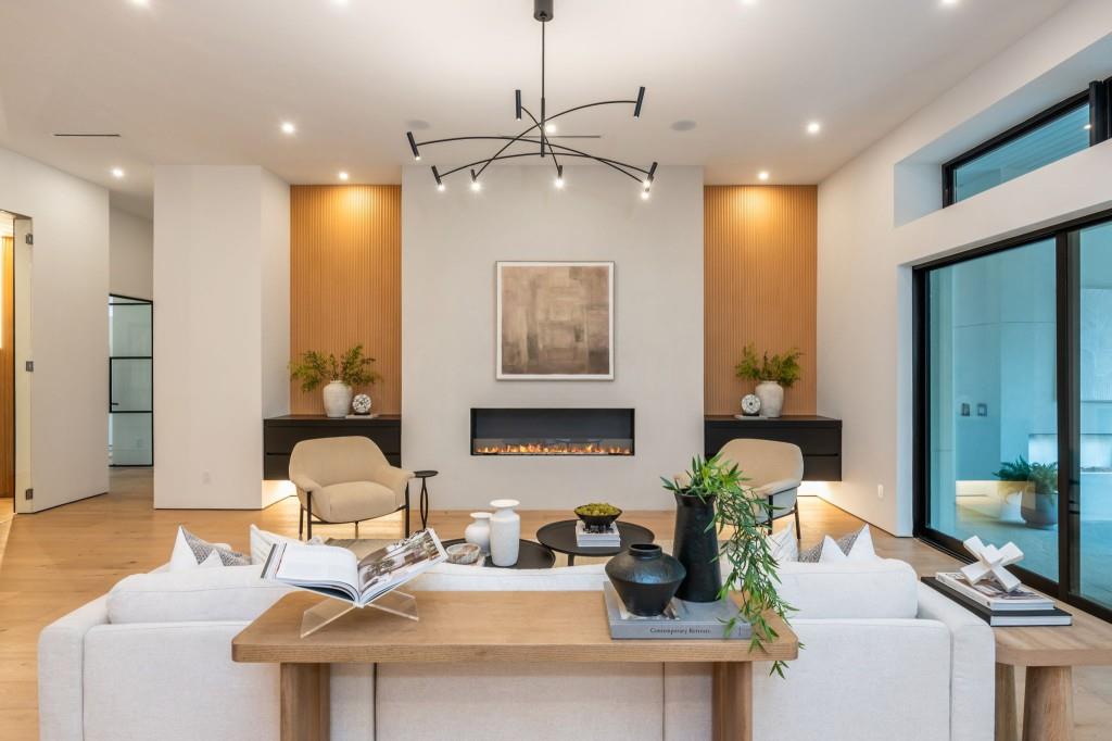 1127 Wimberly Road Northeast Atlanta, GA 30319 - Photo 8 of 37 a living room with furniture and a chandelier