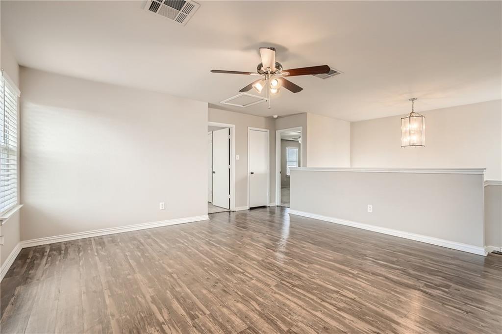 612 Copper Court Jarrell, TX 76537 - Photo 14 of 27 wooden floor in an empty room