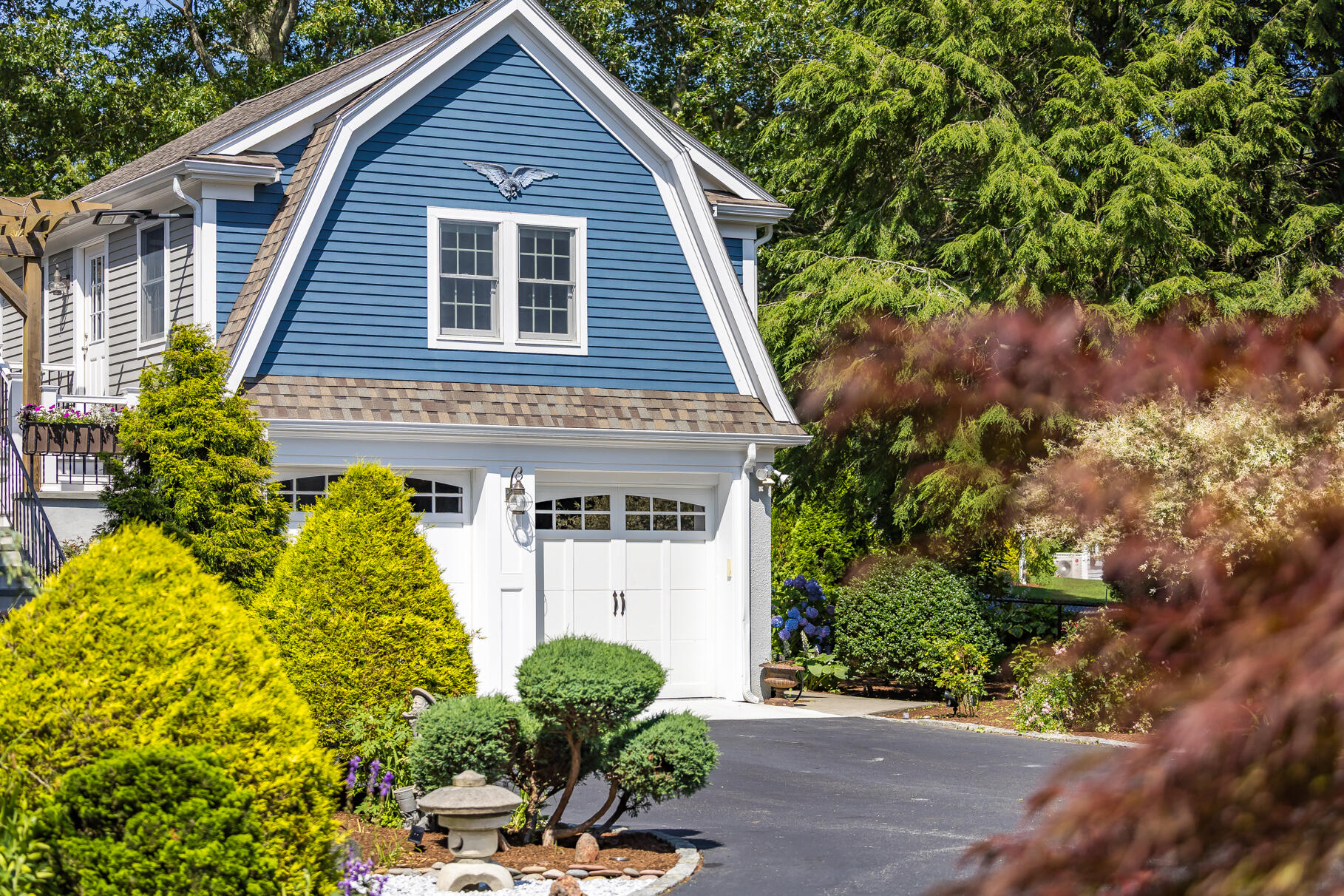 72 River Road Marstons Mills, MA 02648 - Photo 12 of 65 a front view of a house with a yard