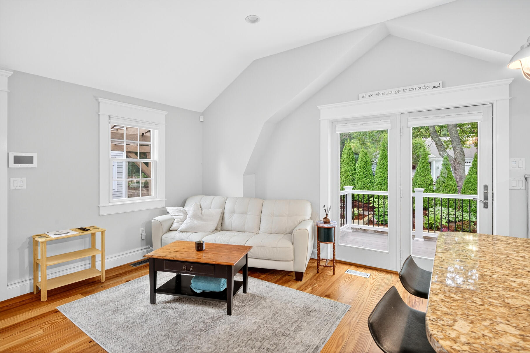72 River Road Marstons Mills, MA 02648 - Photo 15 of 65 a living room with furniture and a rug