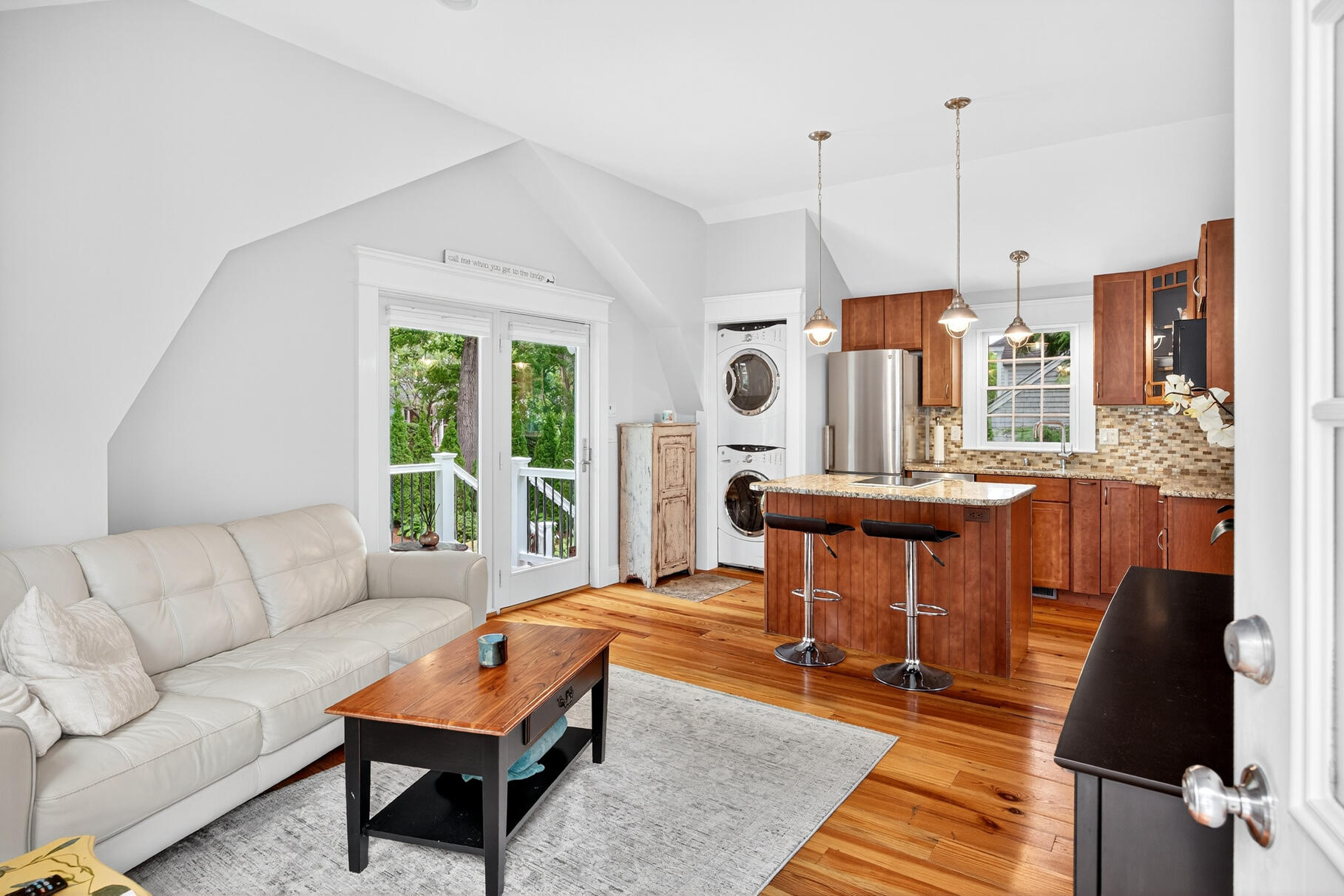 72 River Road Marstons Mills, MA 02648 - Photo 17 of 65 a living room with furniture and a large window