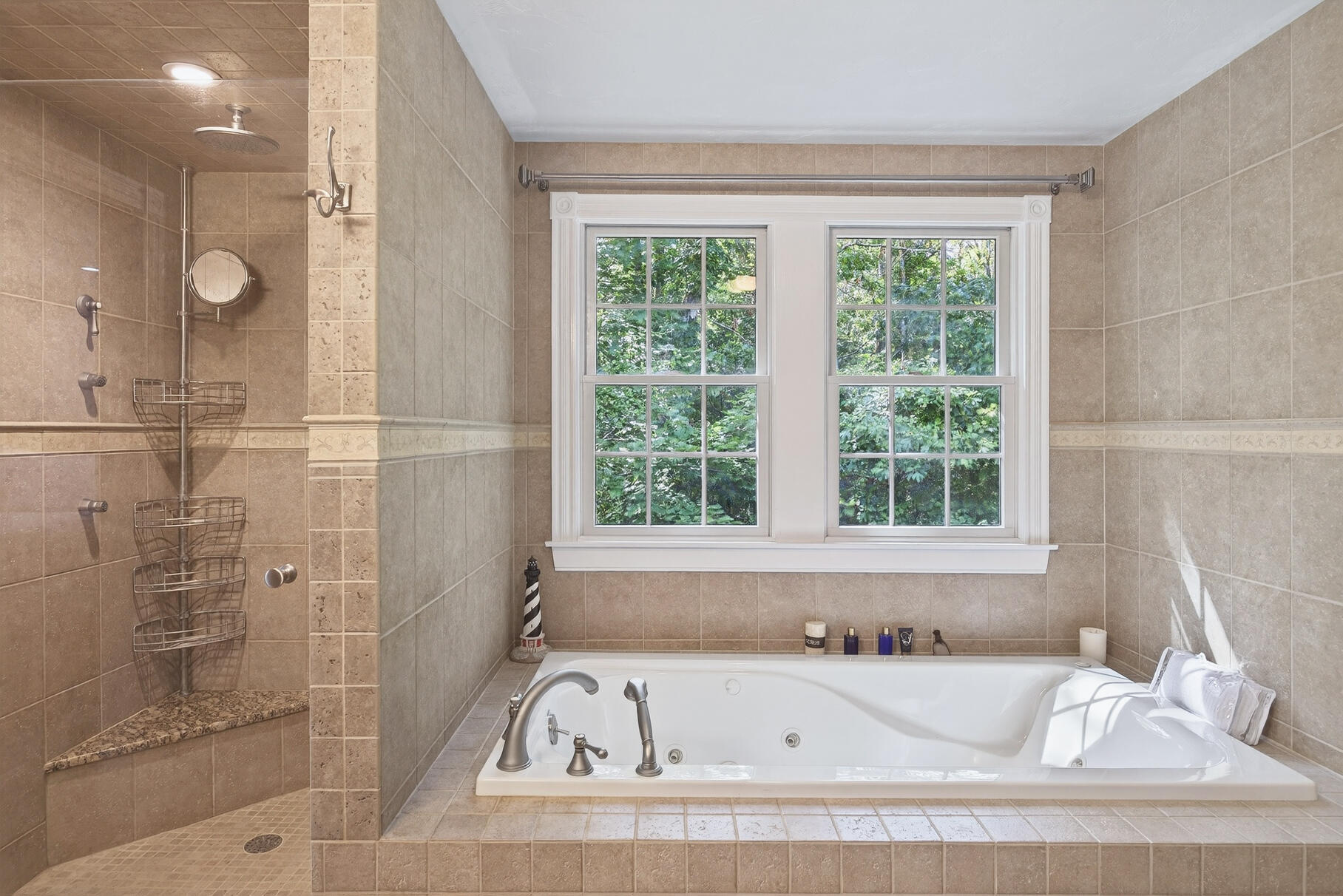 72 River Road Marstons Mills, MA 02648 - Photo 38 of 65 a white bath tub sitting next to a window