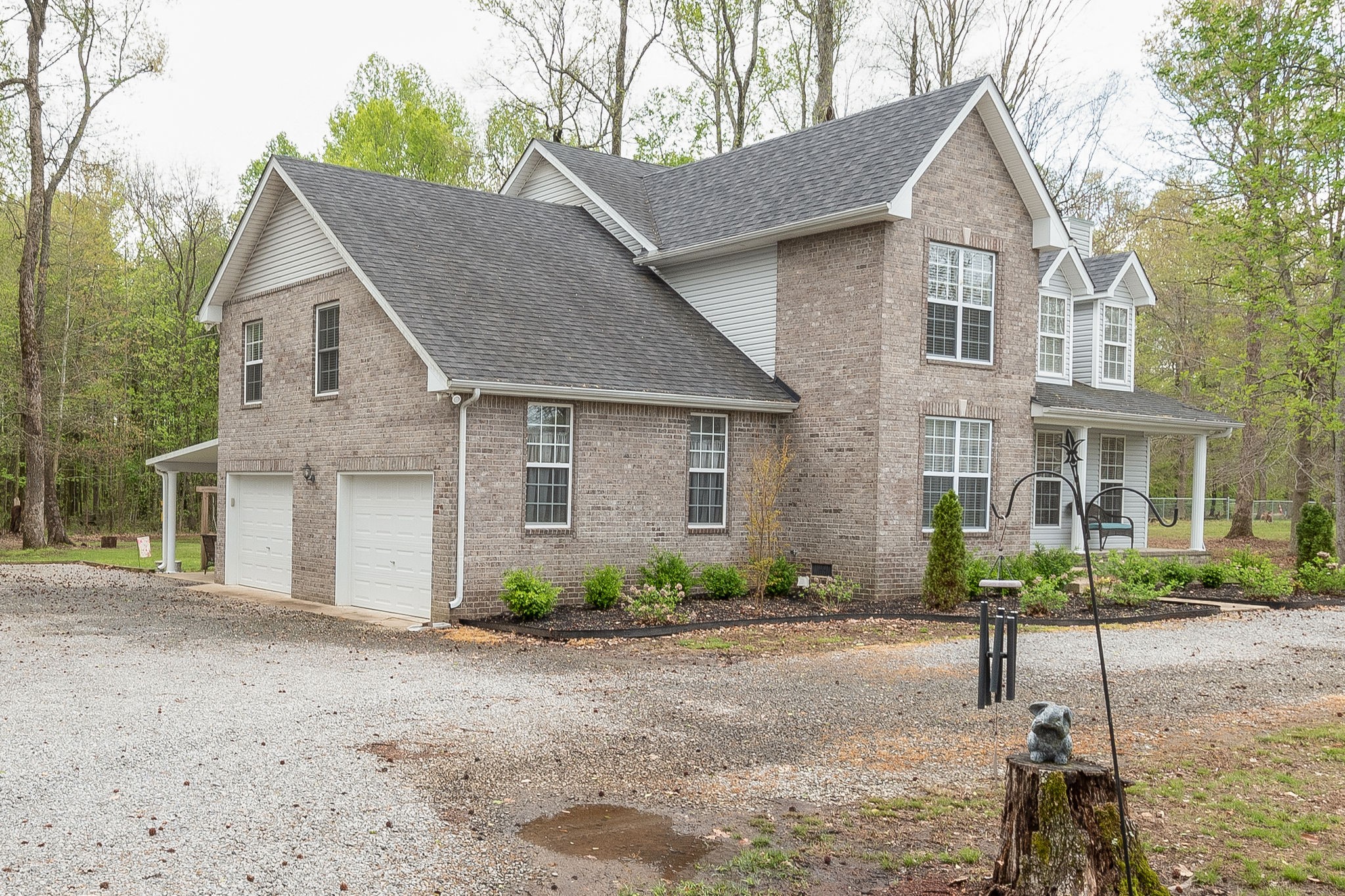 227 Independence Street Springfield, TN 37172 - Photo 3 of 27 a front view of a house with a yard and garage