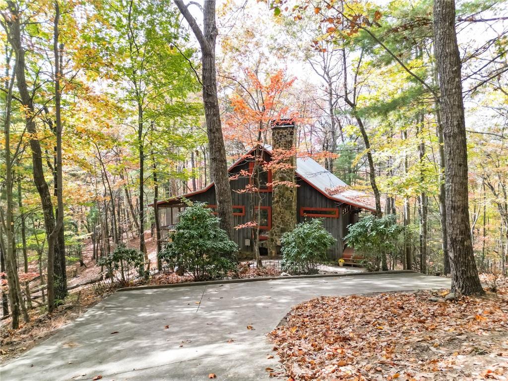 1030 Lost Forest Road Ellijay, GA 30536 - Photo 1 of 1 front view of a house with a tree