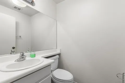 a view of storage and utility room with washer and dryer