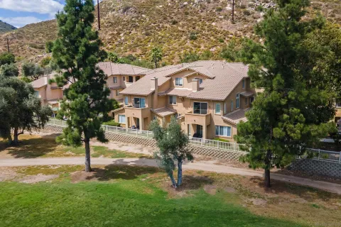 front view of a house with a yard