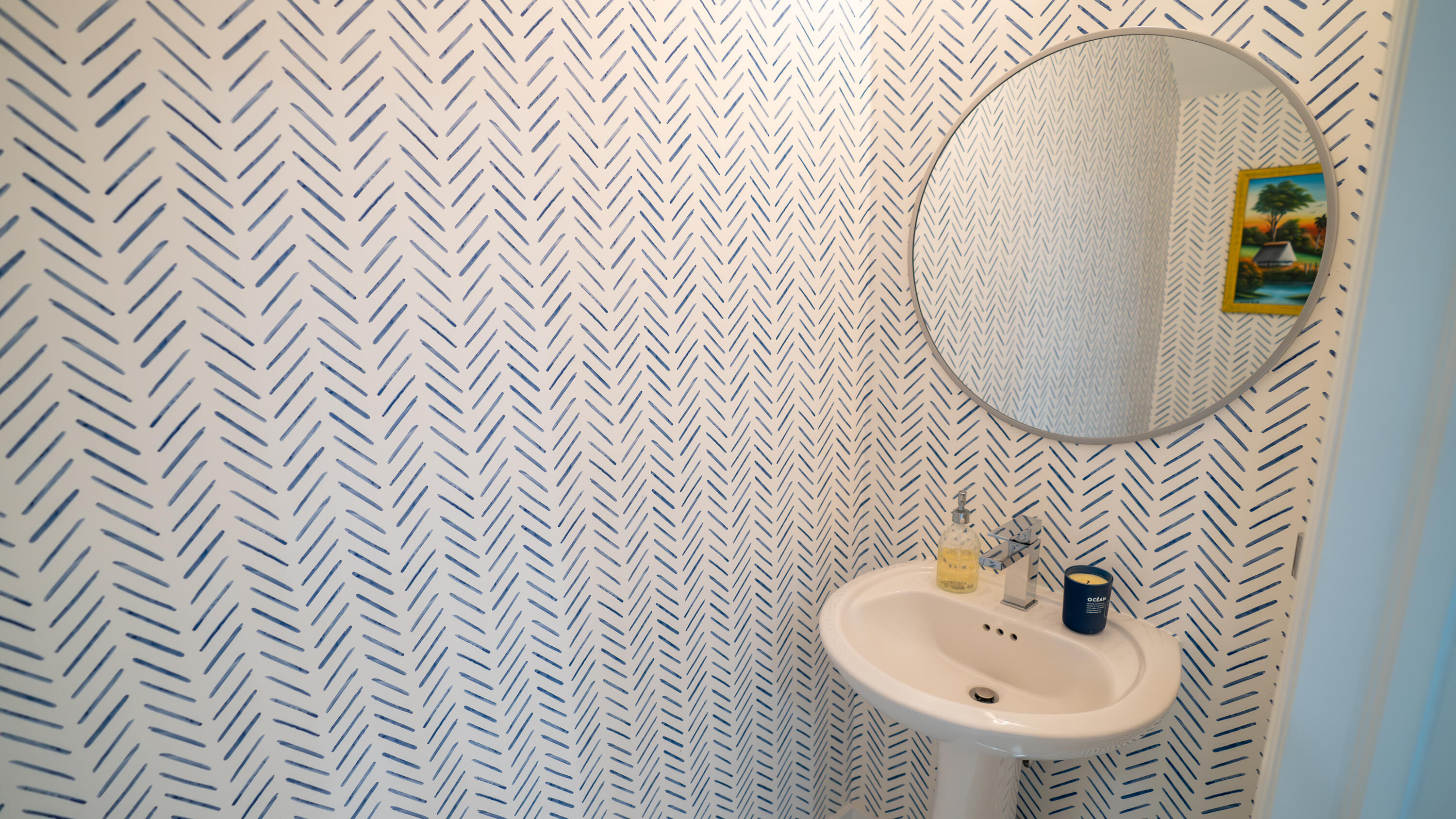 1330 Crystal Way, Unit 107 Delray Beach, FL 33444 - Photo 6 of 23 a bathroom with a sink and mirror with toilet