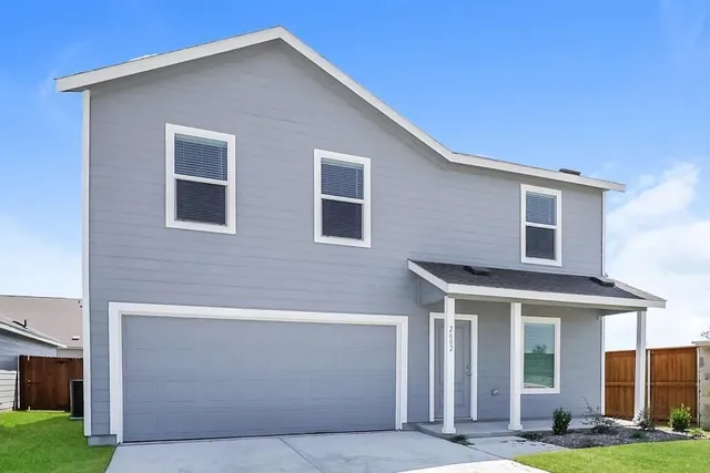 a front view of house with yard