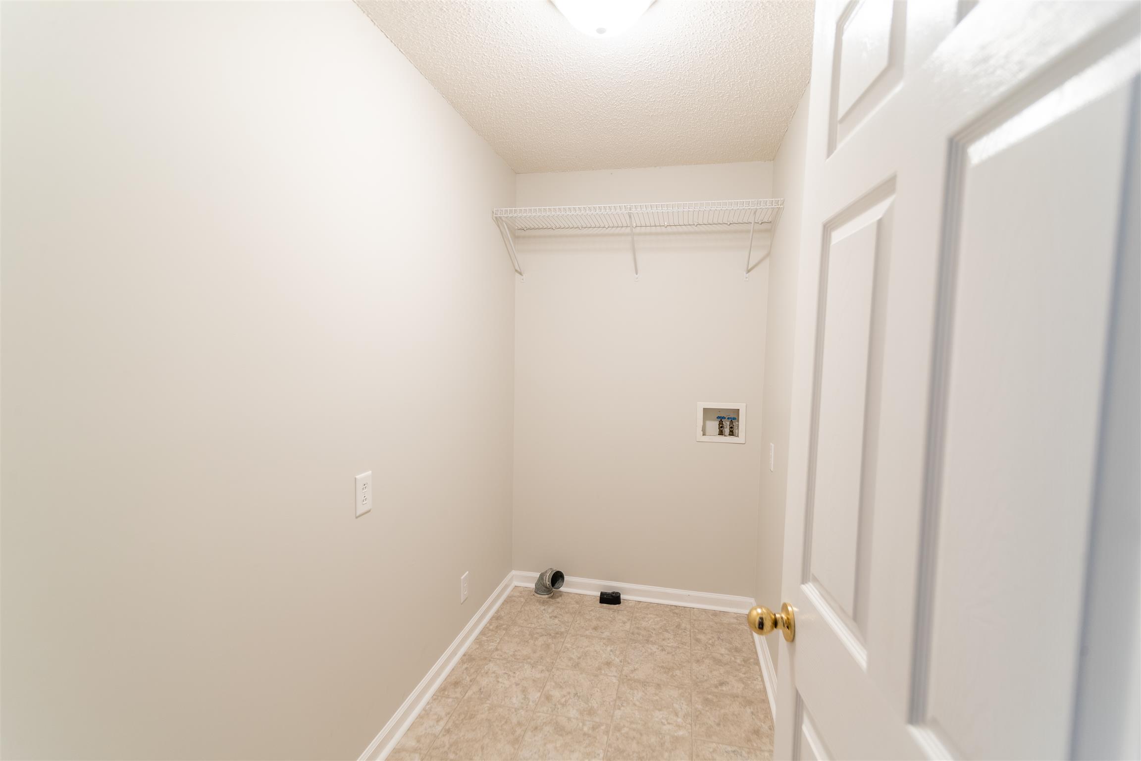 2009 Cherokee Trail Springfield, TN 37172 - Photo 22 of 30 a bathroom with a granite countertop window