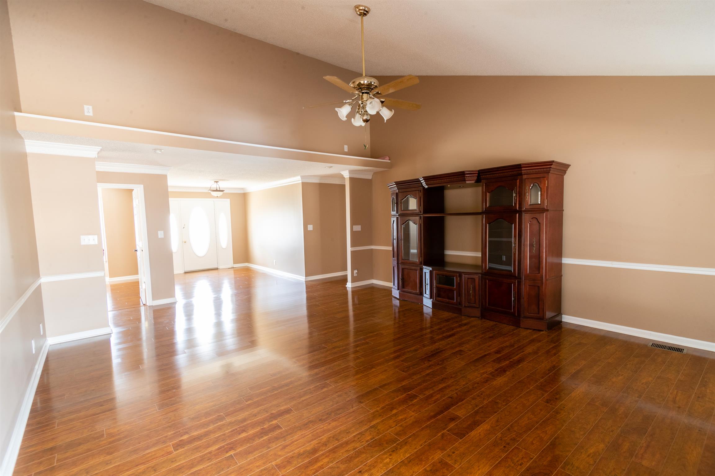 2009 Cherokee Trail Springfield, TN 37172 - Photo 8 of 30 a view of a livingroom with wooden floor and a ceiling fan
