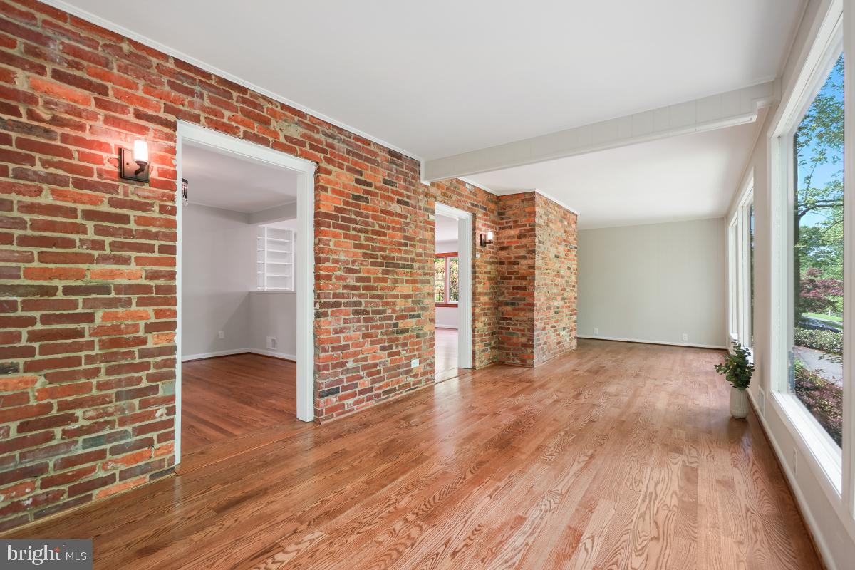 1912 Norvale Road Silver Spring, MD 20906 - Photo 9 of 33 Sunroom with Brick Feature Wall
