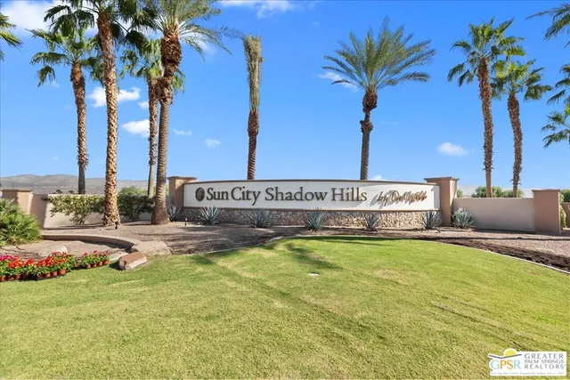 a view of a lake with a yard