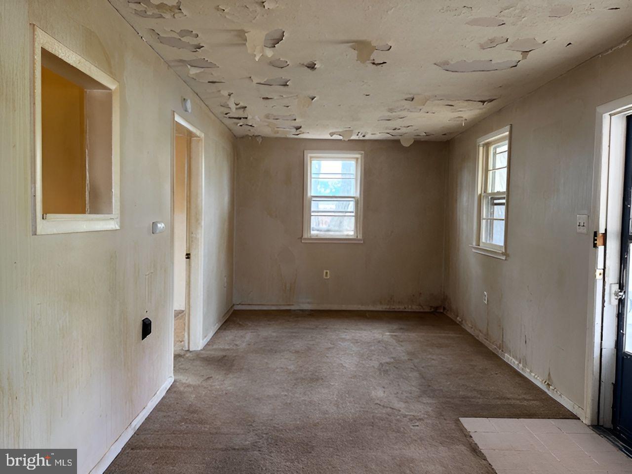 465 Berkley Road Mantua, NJ 08051 - Photo 6 of 12 a view of an empty room with a window
