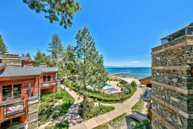 a bed room with a bed and a large window