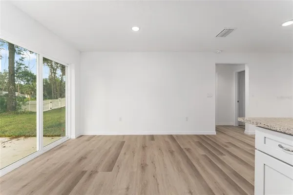 a view of a room with a sink and a window