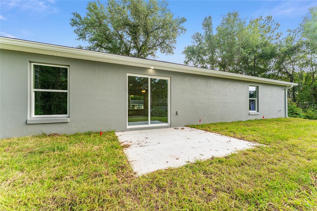 13119 Northeast 7th Loop Silver Springs, FL 34488 - Photo 45 of 51 a house with a outdoor space