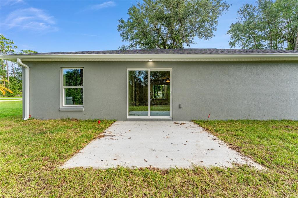 13119 Northeast 7th Loop Silver Springs, FL 34488 - Photo 50 of 51 a house with a outdoor space