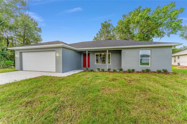 front view of house with a yard