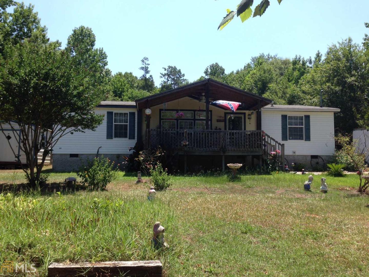 175 Springdale Road, Unit 1 Jackson, GA 30233 - Photo 1 of 1 a view of a house with a yard