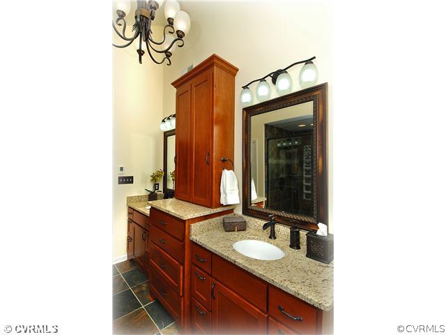 3030 Middlewood Road Midlothian, VA 23113 - Photo 11 of 20 a bathroom with a sink and a mirror