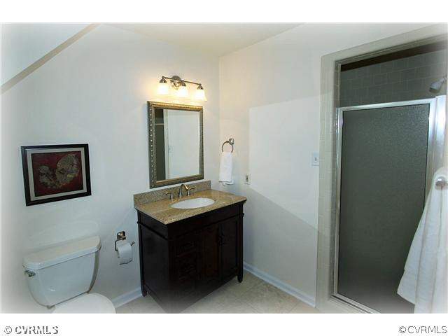 3030 Middlewood Road Midlothian, VA 23113 - Photo 13 of 20 a bathroom with a sink and a mirror