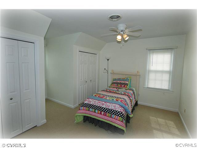 3030 Middlewood Road Midlothian, VA 23113 - Photo 15 of 20 a bedroom with a bed and a window
