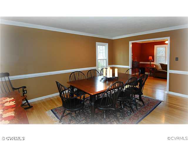 3030 Middlewood Road Midlothian, VA 23113 - Photo 2 of 20 a dining room with furniture and wooden floor