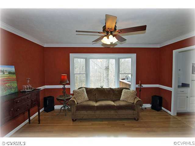3030 Middlewood Road Midlothian, VA 23113 - Photo 3 of 20 a living room with furniture and a flat screen tv