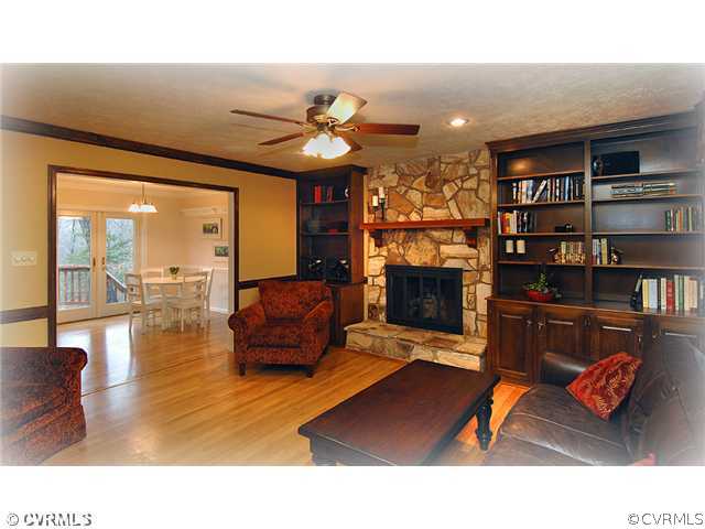 3030 Middlewood Road Midlothian, VA 23113 - Photo 4 of 20 a living room with furniture and a fireplace