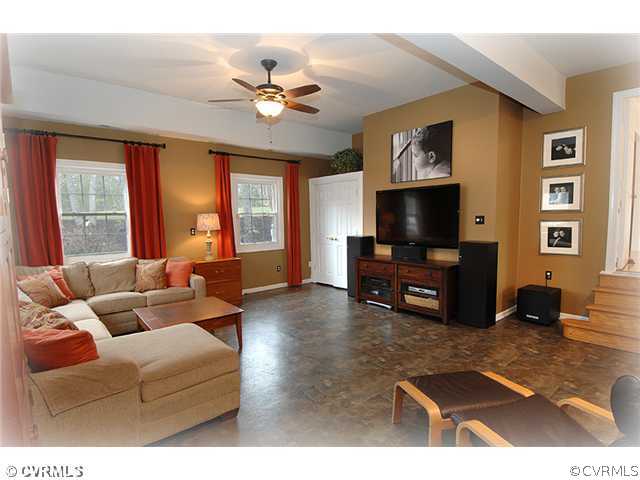 3030 Middlewood Road Midlothian, VA 23113 - Photo 7 of 20 a living room with furniture and a flat screen tv
