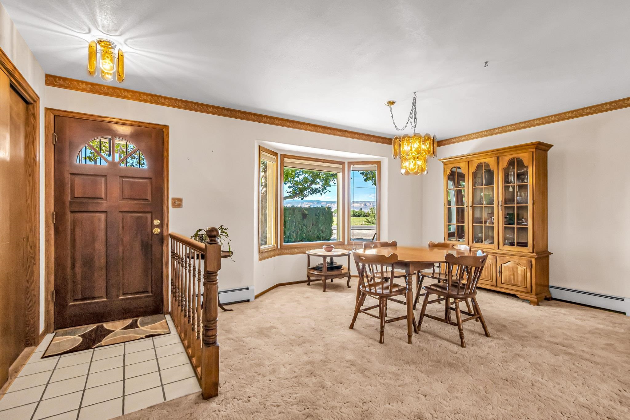 2648 H Road Grand Junction, CO 81506 - Photo 14 of 27 a view of a dining room with furniture window and outside view