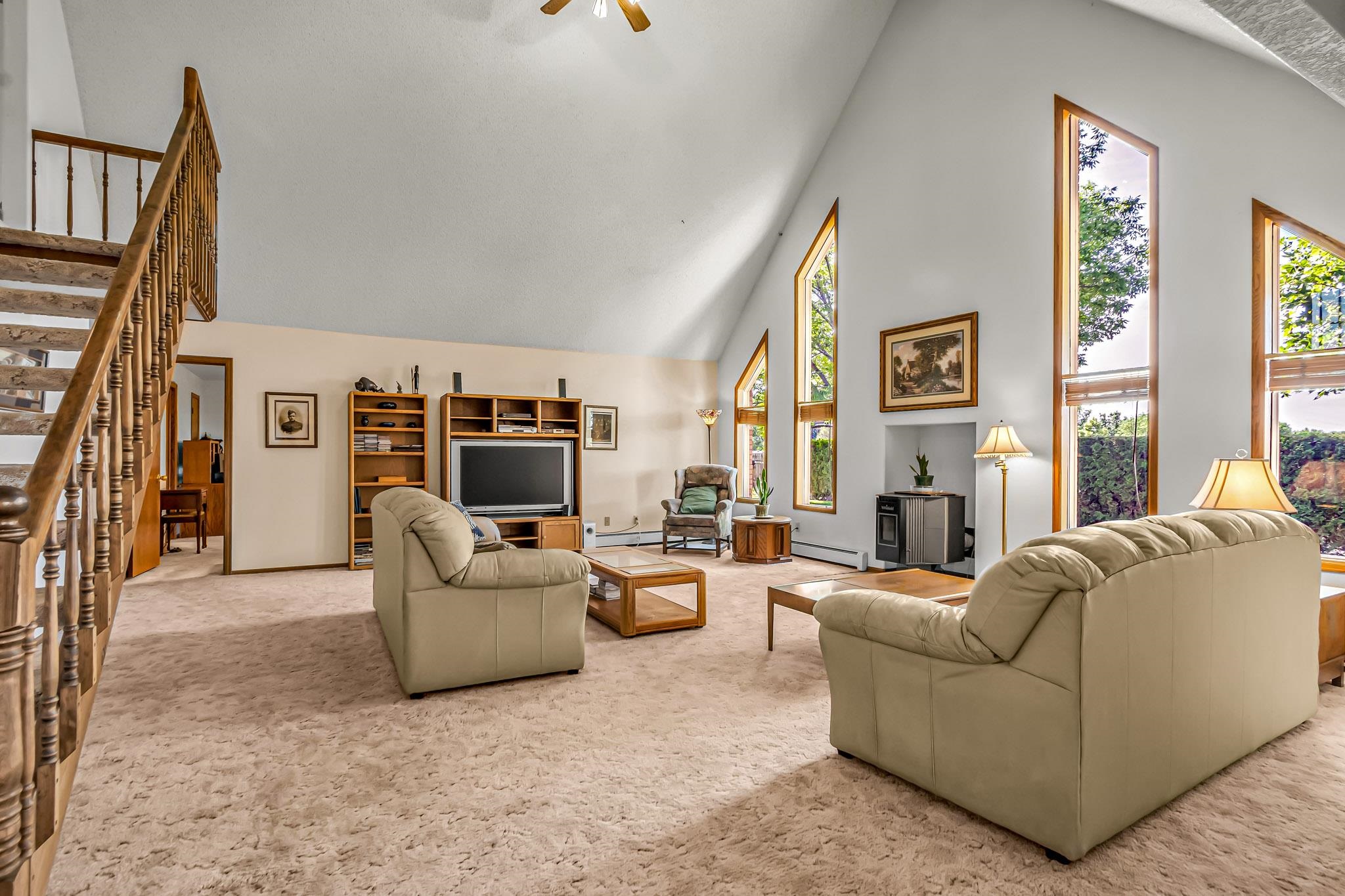 2648 H Road Grand Junction, CO 81506 - Photo 17 of 27 a living room with furniture and a fireplace