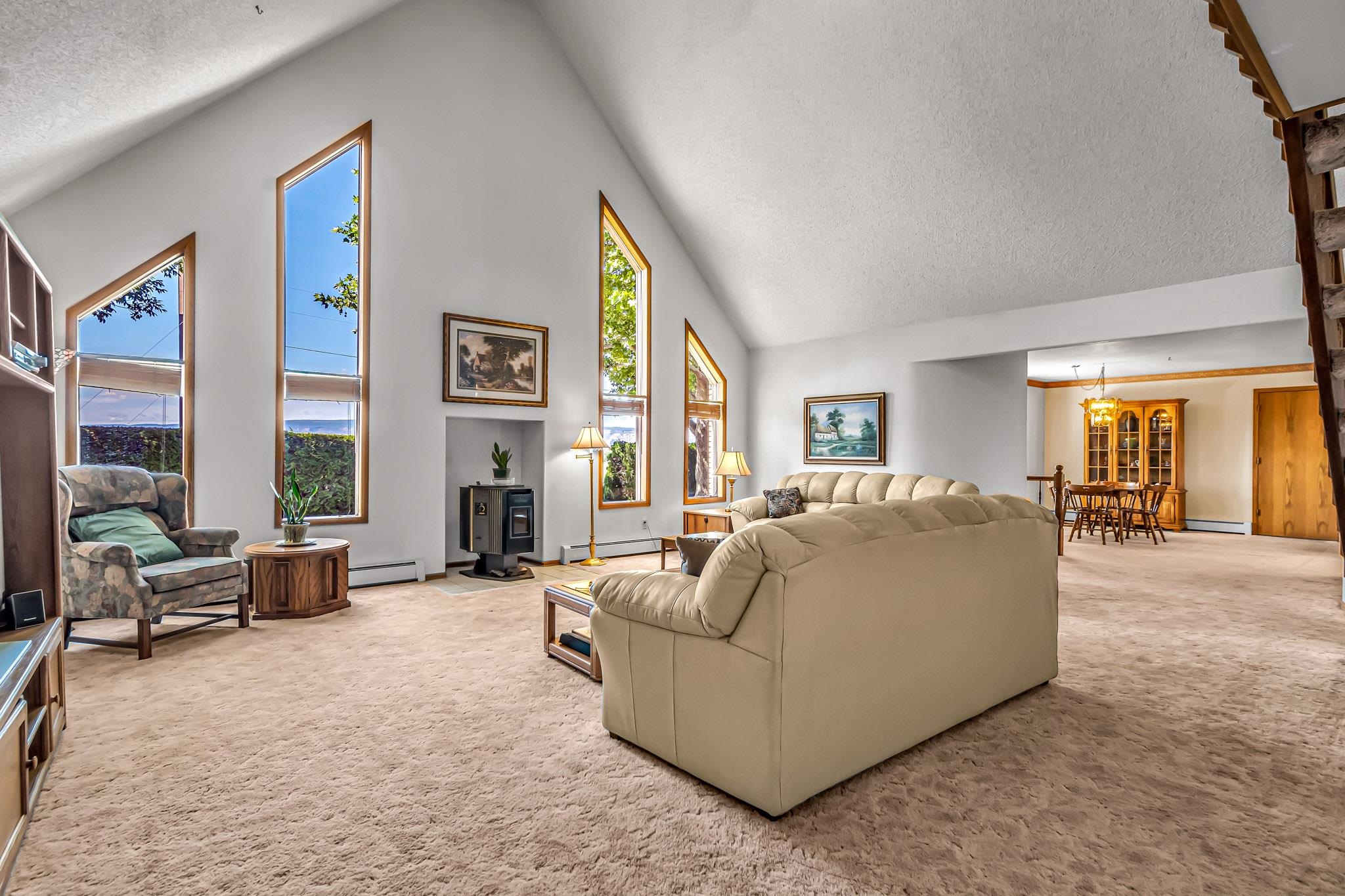 2648 H Road Grand Junction, CO 81506 - Photo 18 of 27 a living room with furniture and large windows